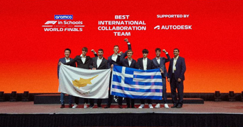 Eight students holding the flags of Cyprus and Greece